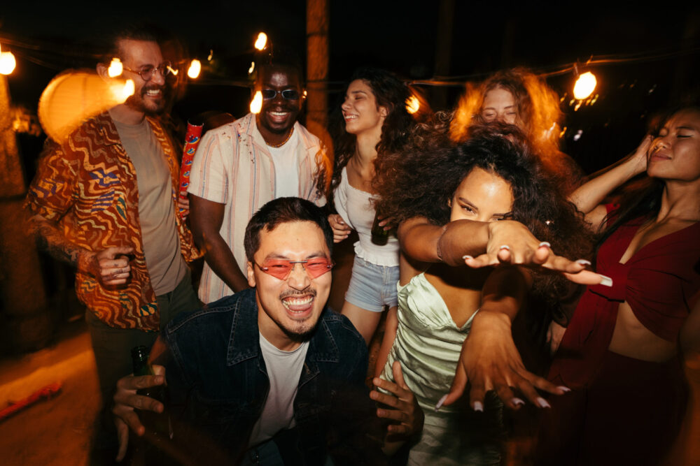 Group of people posing for picture